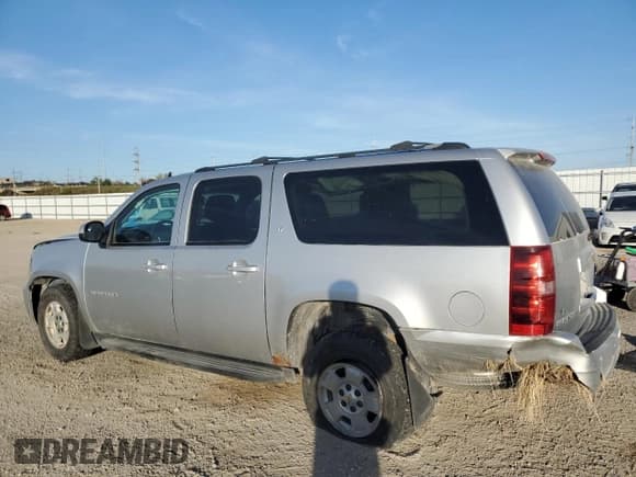 ✅ 2012 Chevrolet Suburban LT • VIN: 1GNSKJE70CR296286 • Lot: 82691045. Listed on Copart with 251,938 mi. Free auction sales archive from the USA and detailed vehicle history report at DreamBid. Image 2.