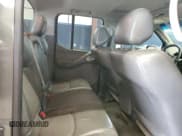 ✅ 2009 Nissan Frontier SE • VIN: 1N6AD09W49C413211 • Lot: 57777185. Listed on Copart with 210,839 mi. Free auction sales archive from the USA and detailed vehicle history report at DreamBid. Image 10.