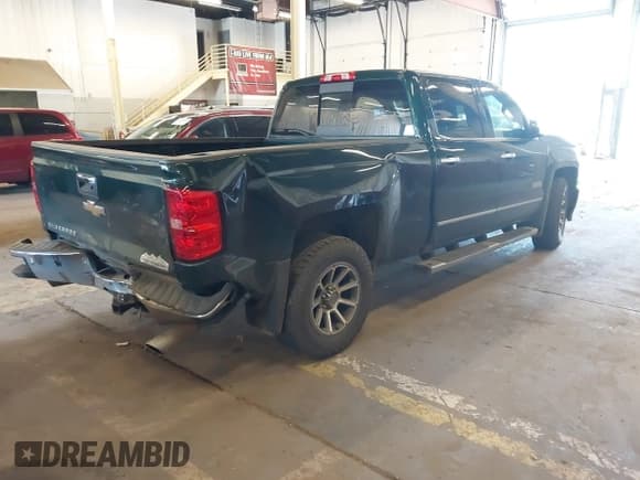 ✅ 2015 Chevrolet Silverado 1500 High Country • VIN: 3GCUKTEJ0FG257243 • Лот: 42064954. Опубликован ранее на IAAI с пробегом 130 320 миль. Бесплатный доступ к архиву аукционных продаж из США и подробный отчёт об истории автомобиля на DreamBid. Изображение 4.