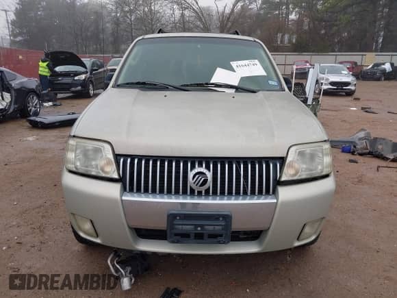 2005 Mercury Mariner Luxury z VIN 4M2YU56175DJ10333, wystawiony jako IAAI lot #41644749 z przebiegiem 174 477 mil mil oraz . Historia ofert i sprzedaży dostępna na DreamBid. Obrazek 6.