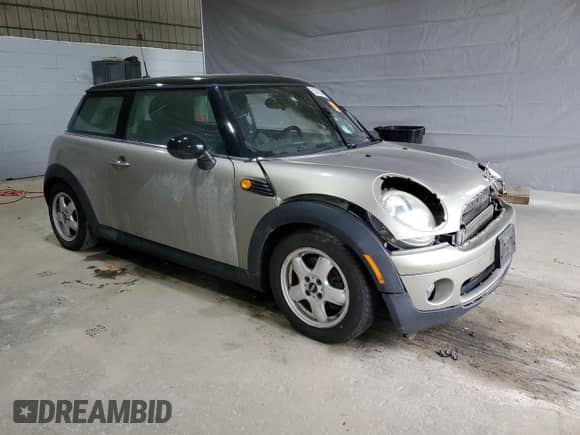 2010 MINI Hardtop with VIN WMWMF3C50ATZ66791, listed as a Copart auction lot 57592875 with Not provided miles and Salvage title. Bid and sale history available at DreamBid. Image 4.