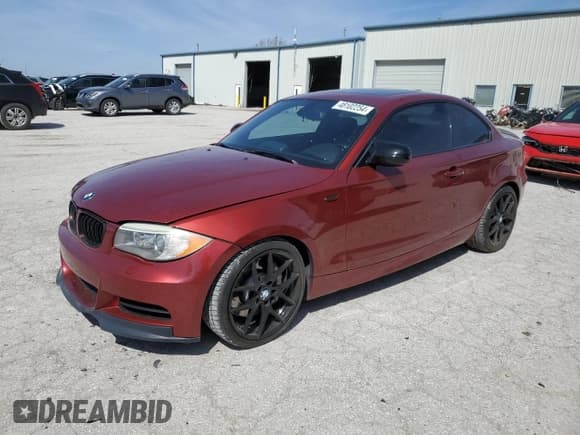 ✅ 2012 BMW 1 Series 135i • VIN: WBAUC9C5XCVM12726 • Lot: 48102254. Listed on Copart with 82,285 mi. Free auction sales archive from the USA and detailed vehicle history report at DreamBid. Image 1.