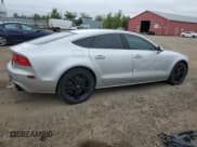 ✅ 2012 Audi A7 • VIN: WAU2GCFC3CN081930 • Лот: 85310805. Опубликован ранее на Copart с пробегом 227 213 миль. Бесплатный доступ к архиву аукционных продаж из США и подробный отчёт об истории автомобиля на DreamBid. Изображение 3.