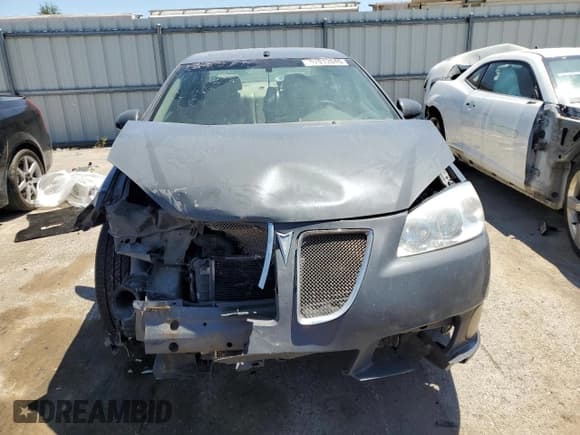 ✅ 2009 Pontiac G6 GXP 1SA • VIN: 1G2ZM577594218327 • Лот: 57912045. Опубликован ранее на Copart с пробегом 161 752 миль. Бесплатный доступ к архиву аукционных продаж из США и подробный отчёт об истории автомобиля на DreamBid. Изображение 5.
