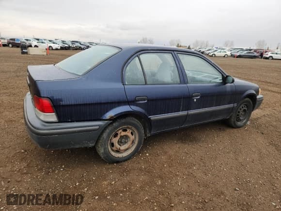 ✅ 1999 Toyota Tercel • VIN: JT2BC53LXX0366733 • Lot: 93113075. Listed on Copart with 163,435 mi. Free auction sales archive from the USA and detailed vehicle history report at DreamBid. Image 3.