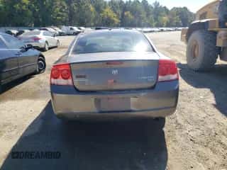 2009 Dodge Charger SXT с VIN 2B3KA33V09H566345, выставлен на аукционе Copart как лот 77218464 с пробегом 284 499 миль миль и Списание • Salvage title. История ставок и продаж доступна на DreamBid. Изображение 6.