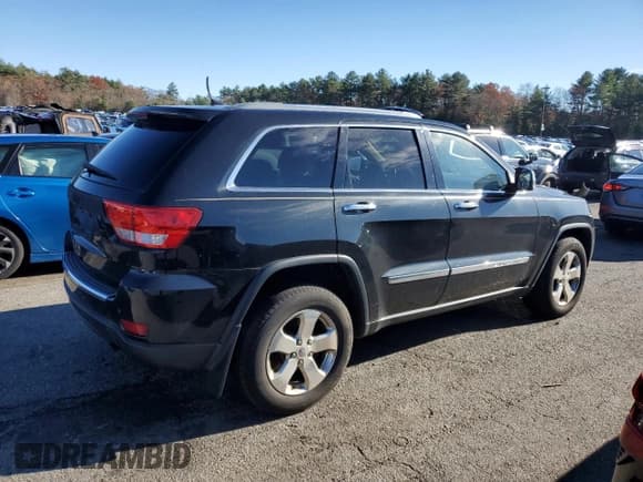 ✅ 2013 Jeep Grand Cherokee Limited • VIN: 1C4RJFBG6DC503084 • Lot: 93554215. Listed on Copart with 215,893 mi. Free auction sales archive from the USA and detailed vehicle history report at DreamBid. Image 3.