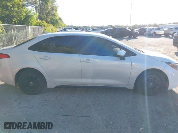 ✅ 2022 Toyota Corolla Hybrid LE • VIN: JTDEAMDE1NJ036006 • Lot: 43697941. Listed on IAAI with 73,310 mi. Free auction sales archive from the USA and detailed vehicle history report at DreamBid. Image 13.