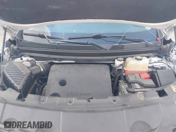 2018 Chevrolet Traverse High Country z VIN 1GNEVKKW3JJ107938, wystawiony jako IAAI lot #43356811 z przebiegiem 76 017 mil mil oraz . Historia ofert i sprzedaży dostępna na DreamBid. Obrazek 10.