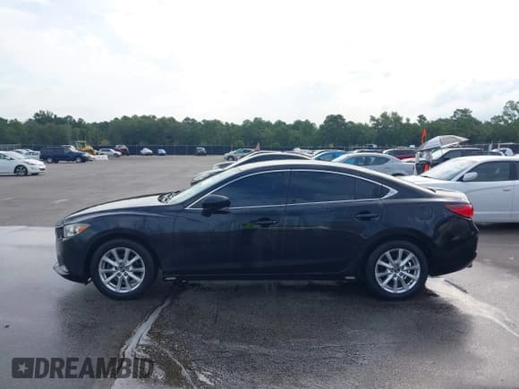 ✅ 2015 Mazda 6 i Sport • VIN: JM1GJ1U50F1201603 • Lot: 43078904. Listed on IAAI with 144,159 mi. Free auction sales archive from the USA and detailed vehicle history report at DreamBid. Image 14.