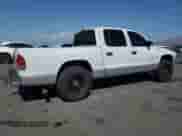 2002 Dodge Dakota SLT z VIN 1B7HL48X82S661284, wystawiony jako Copart lot #59824025 z przebiegiem 187 222 mil mil oraz Szkoda całkowita • Salvage title. Historia ofert i sprzedaży dostępna na DreamBid. Obrazek 3.