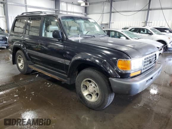 ✅ 1997 Toyota Land Cruiser • VIN: JT3HJ85J0V0184304 • Лот: 72438414. Опубликован ранее на Copart с пробегом 310 213 миль. Бесплатный доступ к архиву аукционных продаж из США и подробный отчёт об истории автомобиля на DreamBid. Изображение 4.