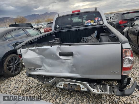 ✅ 2013 Toyota Tacoma • VIN: 3TMLU4EN3DM128443 • Lot: 91794755. Listed on Copart with 164,267 mi. Free auction sales archive from the USA and detailed vehicle history report at DreamBid. Image 6.