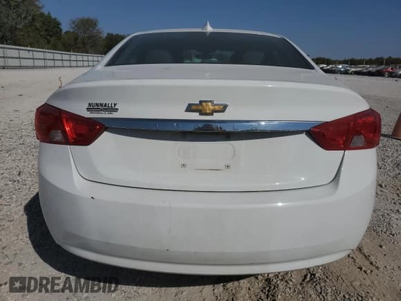 ✅ 2018 Chevrolet Impala LS • VIN: 2G11X5SA8J9141935 • Лот: 75739244. Опубликован ранее на Copart с пробегом 84 150 миль. Бесплатный доступ к архиву аукционных продаж из США и подробный отчёт об истории автомобиля на DreamBid. Изображение 6.
