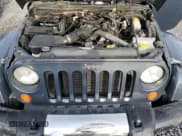 ✅ 2008 Jeep Wrangler Sahara • VIN: 1J8FA541X8L519597 • Лот: 83830965. Опубликован ранее на Copart с пробегом 141 463 миль. Бесплатный доступ к архиву аукционных продаж из США и подробный отчёт об истории автомобиля на DreamBid. Изображение 11.