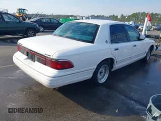 ✅ 1995 Mercury Grand Marquis LS • VIN: 2MELM75W4SX677949 • Lot: 43728062. Wystawiony na IAAI z przebiegiem 234 482 mil. Bezpłatny archiwum sprzedaży aukcyjnych z USA i szczegółowy raport historii pojazdu na DreamBid. Zdjęcie 4.