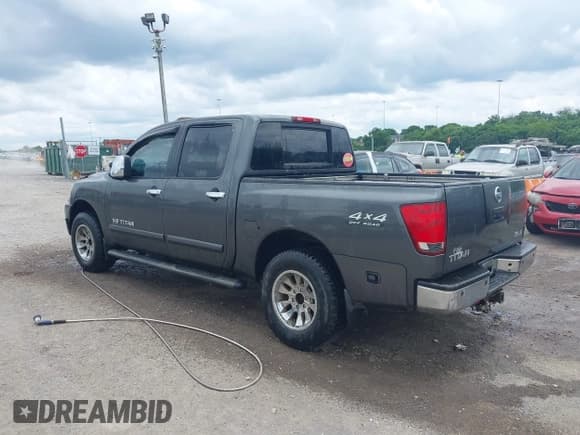 ✅ 2005 Nissan Titan LE • VIN: 1N6AA07B05N557667 • Lot: 42292562. Listed on IAAI with 197,874 mi. Free auction sales archive from the USA and detailed vehicle history report at DreamBid. Image 3.