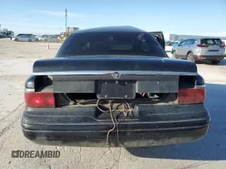 ✅ 1997 Mercury Grand Marquis GS • VIN: 2MELM74W6VX717373 • Lot: 69965364. Wystawiony na Copart z przebiegiem 191 478 mil. Bezpłatny archiwum sprzedaży aukcyjnych z USA i szczegółowy raport historii pojazdu na DreamBid. Zdjęcie 6.