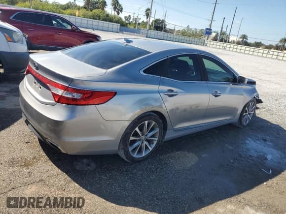 ✅ 2016 Hyundai Azera • VIN: KMHFG4JG0GA506078 • Лот: 91454275. Опубликован ранее на Copart с пробегом 126 692 миль. Бесплатный доступ к архиву аукционных продаж из США и подробный отчёт об истории автомобиля на DreamBid. Изображение 3.