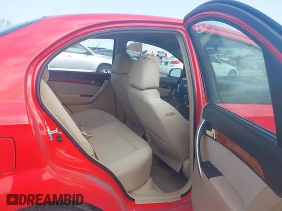 ✅ 2011 Chevrolet Aveo 1LT • VIN: KL1TD5DE1BB144692 • Lot: 41908565. Listed on IAAI with 104,691 mi. Free auction sales archive from the USA and detailed vehicle history report at DreamBid. Image 8.