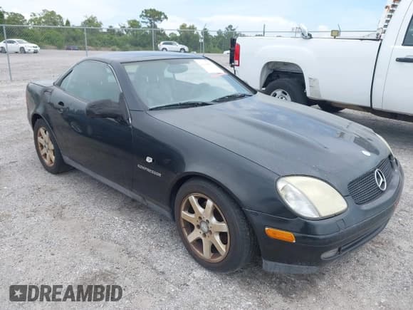 ✅ 1999 Mercedes-Benz SLK 230/320 • VIN: WDBKK47F0XF086064 • Лот: 42380513. Опубликован ранее на IAAI с пробегом 166 381 миль. Бесплатный доступ к архиву аукционных продаж из США и подробный отчёт об истории автомобиля на DreamBid. Изображение 1.