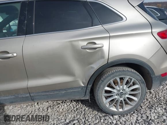 ✅ 2015 Lincoln MKC • VIN: 5LMCJ1A97FUJ46550 • Lot: 43717504. Listed on IAAI with 151,722 mi. Free auction sales archive from the USA and detailed vehicle history report at DreamBid. Image 6.