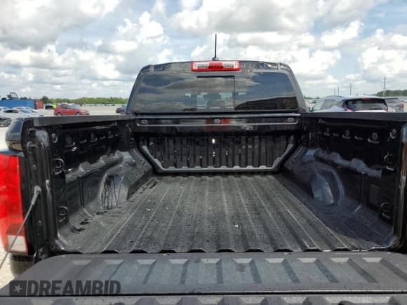 ✅ 2023 Chevrolet Colorado 4WD Trail Boss • VIN: 1GCPTEEK0P1252834 • Лот: 71637444. Опубликован ранее на Copart с пробегом 8 096 миль. Бесплатный доступ к архиву аукционных продаж из США и подробный отчёт об истории автомобиля на DreamBid. Изображение 12.