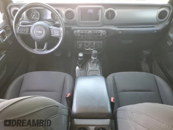 ✅ 2022 Jeep Gladiator Willys Sport • VIN: 1C6HJTAG2NL133000 • Лот: 58416125. Опубликован ранее на Copart с пробегом 65 590 миль. Бесплатный доступ к архиву аукционных продаж из США и подробный отчёт об истории автомобиля на DreamBid. Изображение 8.