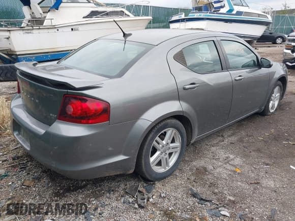 ✅ 2013 Dodge Avenger SXT • VIN: 1C3CDZCG0DN521540 • Lot: 40772548. Listed on IAAI with 145,455 mi. Free auction sales archive from the USA and detailed vehicle history report at DreamBid. Image 4.