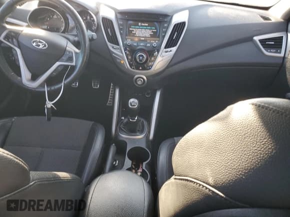 ✅ 2013 Hyundai Veloster w/Gray Int • VIN: KMHTC6AD2DU114732 • Lot: 74368394. Wystawiony na Copart z przebiegiem 166 996 mil. Bezpłatny archiwum sprzedaży aukcyjnych z USA i szczegółowy raport historii pojazdu na DreamBid. Zdjęcie 8.