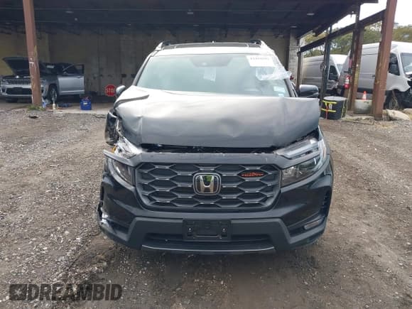 ✅ 2023 Honda Passport TrailSport • VIN: 5FNYF8H62PB040701 • Lot: 43494593. Listed on IAAI with 13,186 mi. Free auction sales archive from the USA and detailed vehicle history report at DreamBid. Image 12.