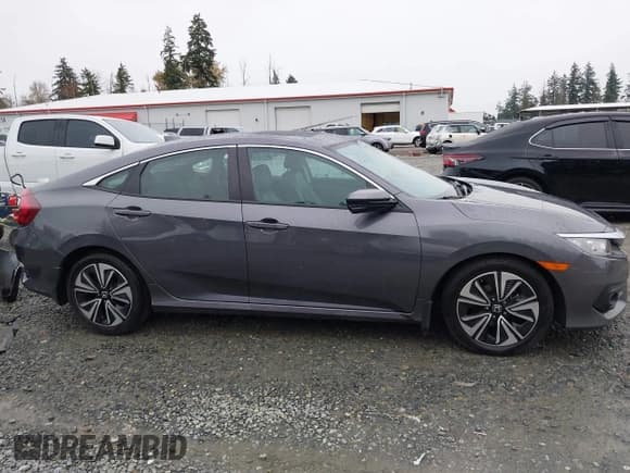 ✅ 2018 Honda Civic EX-L • VIN: 2HGFC1F74JH640836 • Lot: 43597247. Listed on IAAI with 76,137 mi. Free auction sales archive from the USA and detailed vehicle history report at DreamBid. Image 14.