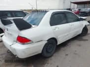 ✅ 2004 Mitsubishi Lancer ES • VIN: JA3AJ26E24U010333 • Lot: 42712708. Listed on IAAI with 249,376 mi. Free auction sales archive from the USA and detailed vehicle history report at DreamBid. Image 4.