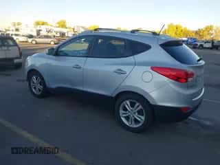 2012 Hyundai Tucson Limited with VIN KM8JUCAC2CU433184, listed as a IAAI auction lot 43557803 with 204,139 mi miles and . Bid and sale history available at DreamBid. Image 3.