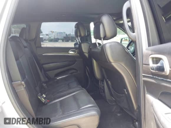 2018 Jeep Grand Cherokee Limited z VIN 1C4RJEBG4JC131623, wystawiony jako IAAI lot #42806022 z przebiegiem 137 938 mil mil oraz . Historia ofert i sprzedaży dostępna na DreamBid. Obrazek 8.