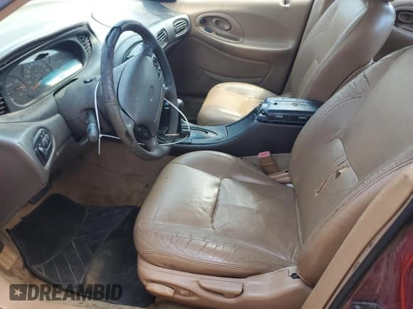 ✅ 1997 Ford Taurus LX • VIN: 1FALP53S1VG148018 • Lot: 67036654. Listed on Copart with 166,162 mi. Free auction sales archive from the USA and detailed vehicle history report at DreamBid. Image 7.