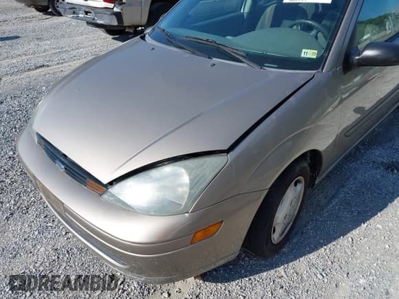✅ 2003 Ford Focus LX • VIN: 1FAFP33P63W324786 • Lot: 42693187. Wystawiony na IAAI z przebiegiem 128 597 mil. Bezpłatny archiwum sprzedaży aukcyjnych z USA i szczegółowy raport historii pojazdu na DreamBid. Zdjęcie 19.