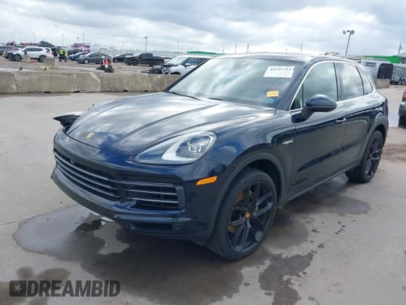 ✅ 2022 Porsche Cayenne E-Hybrid • VIN: WP1AE2AYXNDA26559 • Lot: 41113313. Listed on IAAI with 28,591 mi. Free auction sales archive from the USA and detailed vehicle history report at DreamBid. Image 2.