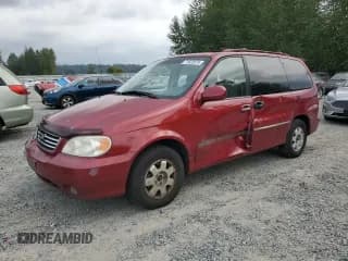 ✅ 2002 Kia Sedona LX • VIN: KNDUP131526222346 • Лот: 71923575. Опубликован ранее на Copart с пробегом 184 620 миль. Бесплатный доступ к архиву аукционных продаж из США и подробный отчёт об истории автомобиля на DreamBid. Изображение 1.