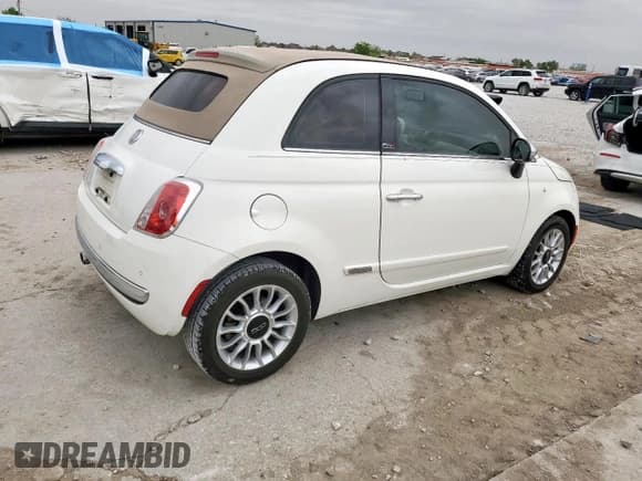 ✅ 2015 FIAT 500 Lounge • VIN: 3C3CFFER3FT513622 • Lot: 51696875. Wystawiony na Copart z przebiegiem 179 535 mil. Bezpłatny archiwum sprzedaży aukcyjnych z USA i szczegółowy raport historii pojazdu na DreamBid. Zdjęcie 3.