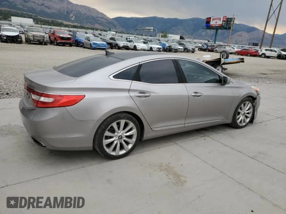✅ 2013 Hyundai Azera • VIN: KMHFH4JG1DA307985 • Лот: 66847515. Опубликован ранее на Copart с пробегом 122 462 миль. Бесплатный доступ к архиву аукционных продаж из США и подробный отчёт об истории автомобиля на DreamBid. Изображение 3.