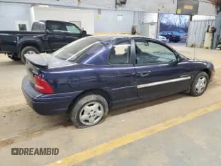 ✅ 1998 Dodge Neon • VIN: 1B3ES42Y8WD642673 • Lot: 85553634. Listed on Copart with 146,232 mi. Free auction sales archive from the USA and detailed vehicle history report at DreamBid. Image 3.