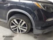 ✅ 2016 Honda Pilot Touring • VIN: 5FNYF5H91GB006631 • Lot: 43566110. Listed on IAAI with 144,494 mi. Free auction sales archive from the USA and detailed vehicle history report at DreamBid. Image 6.