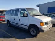 ✅ 2004 Ford Econoline Passenger XL • VIN: 1FMRE11W84HA50164 • Lot: 73438464. Listed on Copart with 148,916 mi. Free auction sales archive from the USA and detailed vehicle history report at DreamBid. Image 4.