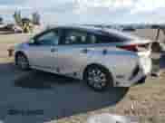 2021 Toyota Prius LE z VIN JTDKAMFP6M3174337, wystawiony jako Copart lot #81413265 z przebiegiem 142 475 mil mil oraz Szkoda całkowita • Salvage title. Historia ofert i sprzedaży dostępna na DreamBid. Obrazek 2.
