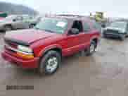 2003 Chevrolet Blazer LS z VIN 1GNCT18X93K171504, wystawiony jako IAAI lot #41682798 z przebiegiem 74 017 mil mil oraz . Historia ofert i sprzedaży dostępna na DreamBid. Obrazek 2.
