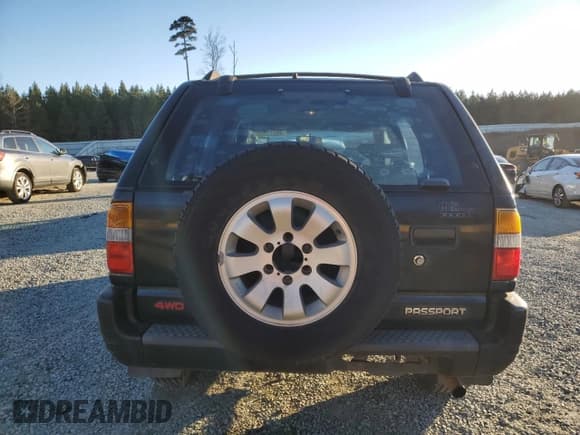 ✅ 1998 Honda Passport LX • VIN: 4S6CM58W7W4419247 • Lot: 88231175. Listed on Copart with 194,105 mi. Free auction sales archive from the USA and detailed vehicle history report at DreamBid. Image 6.