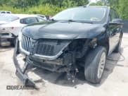 ✅ 2015 Lincoln MKX • VIN: 2LMDJ8JK1FBL31075 • Lot: 40122706. Listed on IAAI with 247,778 mi. Free auction sales archive from the USA and detailed vehicle history report at DreamBid. Image 6.