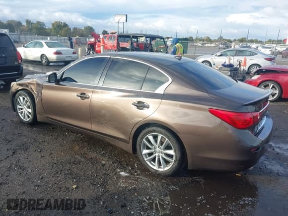 ✅ 2014 Infiniti Q50 Premium • VIN: JN1BV7AP5EM673500 • Lot: 43550028. Listed on IAAI with 139,057 mi. Free auction sales archive from the USA and detailed vehicle history report at DreamBid. Image 3.