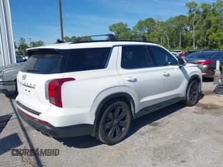 ✅ 2023 Hyundai Palisade XRT • VIN: KM8R34GE8PU560774 • Лот: 41463864. Опубликован ранее на IAAI с пробегом 52 783 миль. Бесплатный доступ к архиву аукционных продаж из США и подробный отчёт об истории автомобиля на DreamBid. Изображение 4.